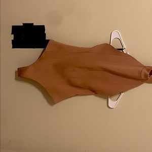 Backless halter top body suit